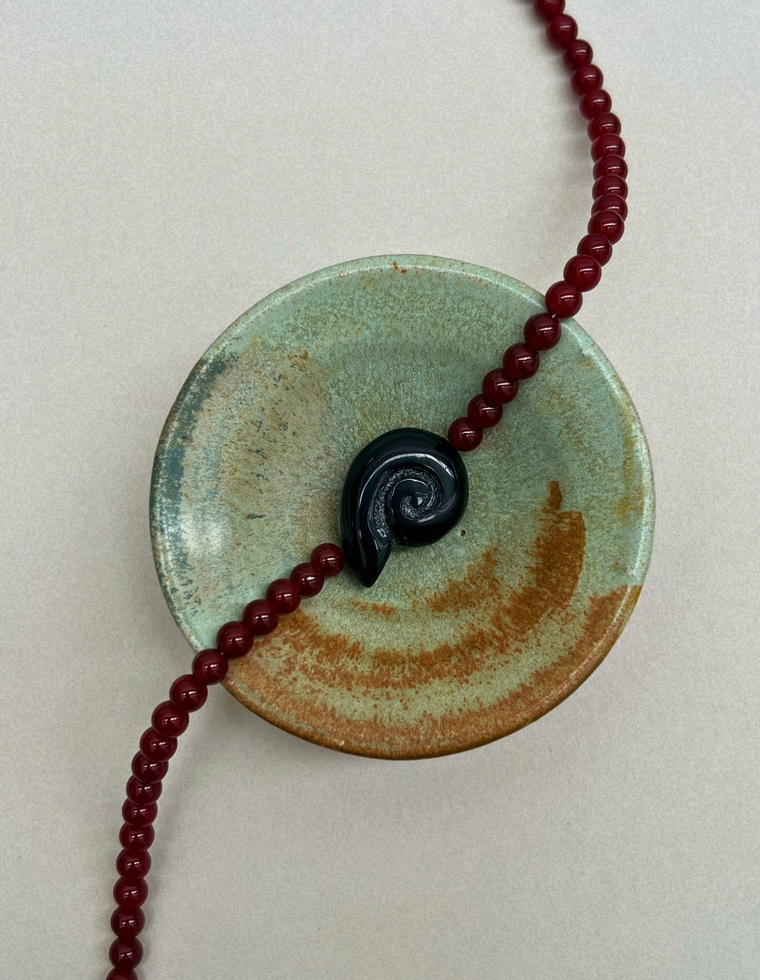 Axis 3: carnelian whorl necklace, hand-strung by Palm of Feronia