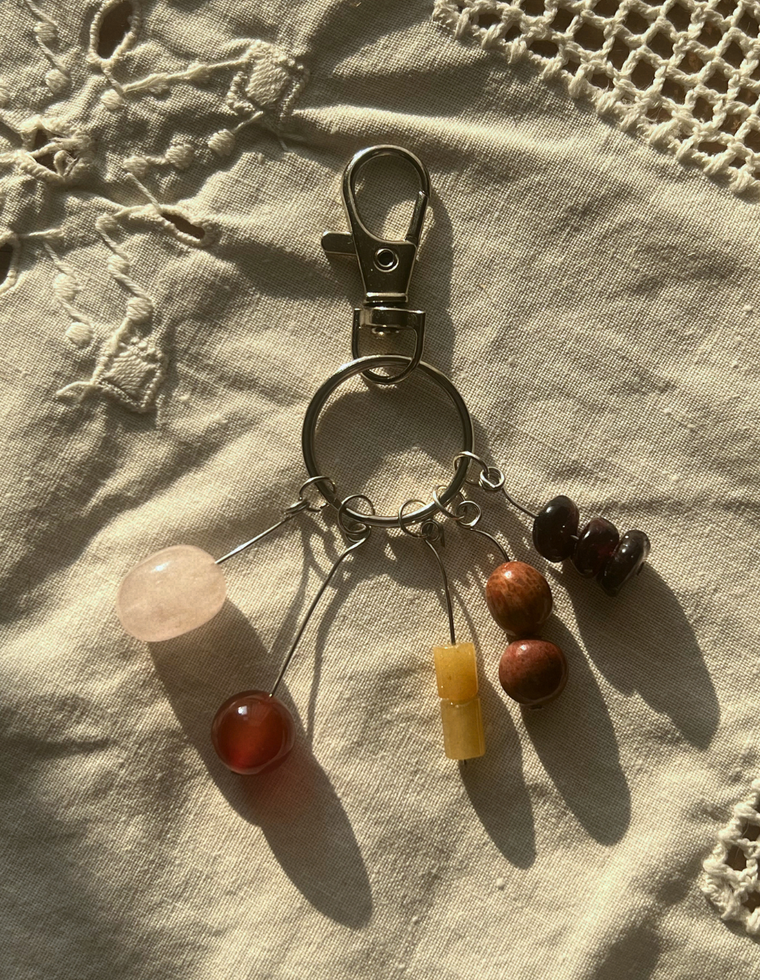 Orbit Charm – Garnet & Fossilised Coral