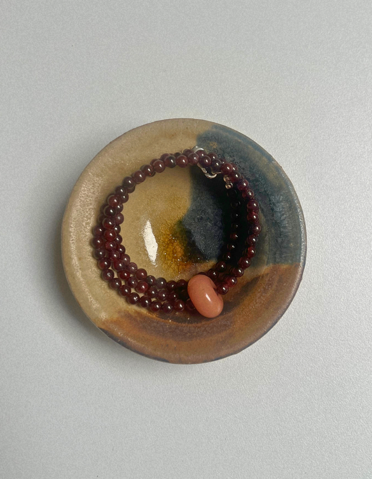 Idle Hands 1 - Garnet Movement Necklace