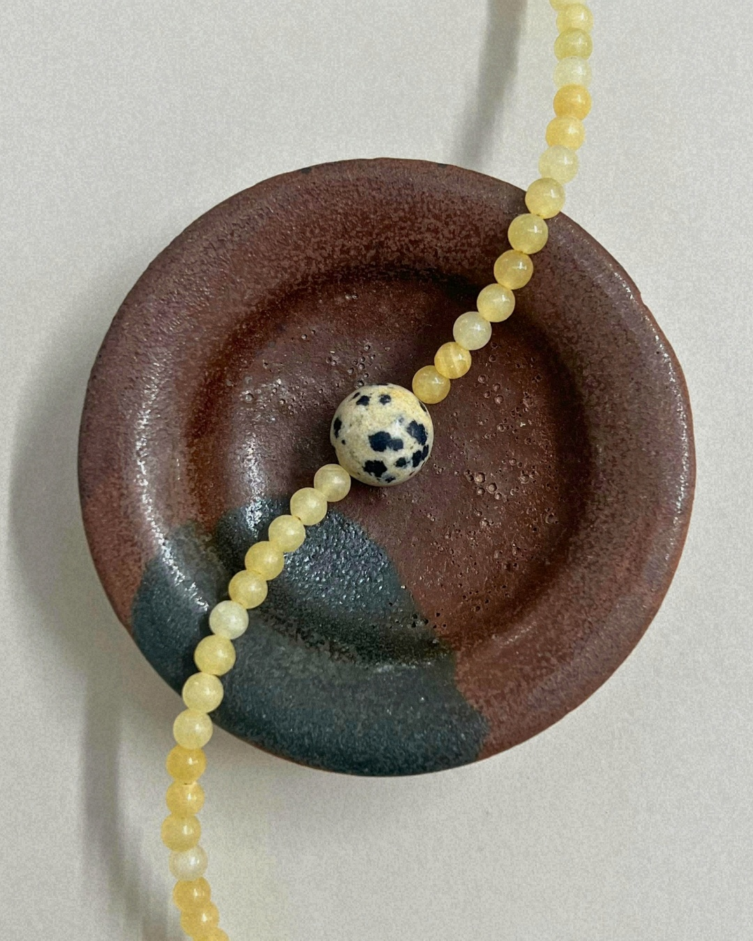 Harvest 12: yellow jade and dalmatian jasper necklace, hand-strung by Palm of Feronia
