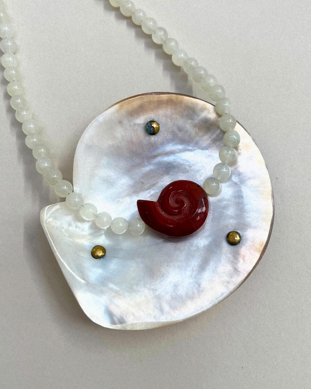 Celadon 11: bowenite whorl necklace, hand-strung by Palm of Feronia