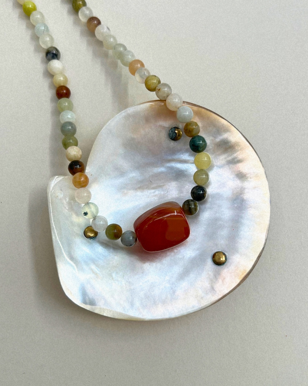 Celadon 9: butter jade and carnelian necklace, hand-strung by Palm of Feronia