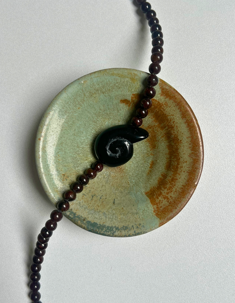 Counterpoint  7 – Garnet Whorl Necklace