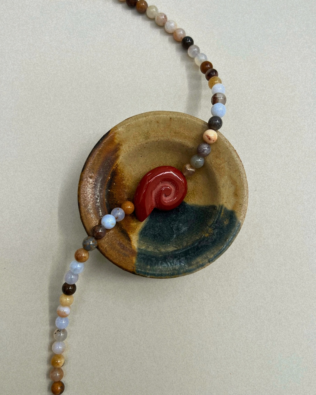 Celadon 7: chalcedony whorl necklace, hand-strung by Palm of Feronia