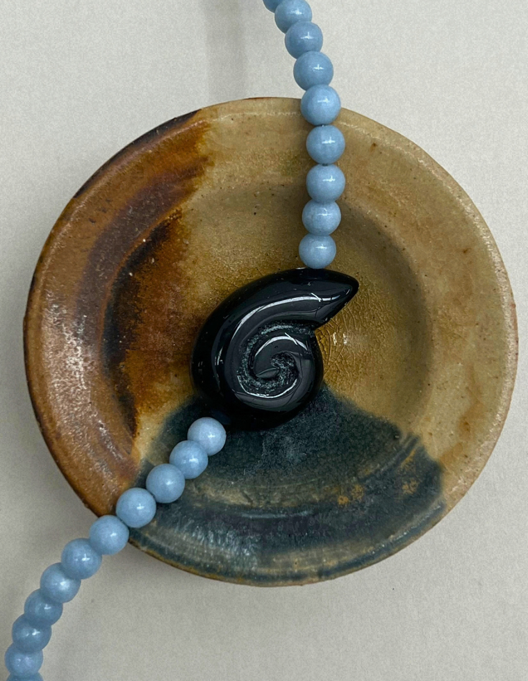 Axis 8: angelite whorl necklace, hand-strung by Palm of Feronia