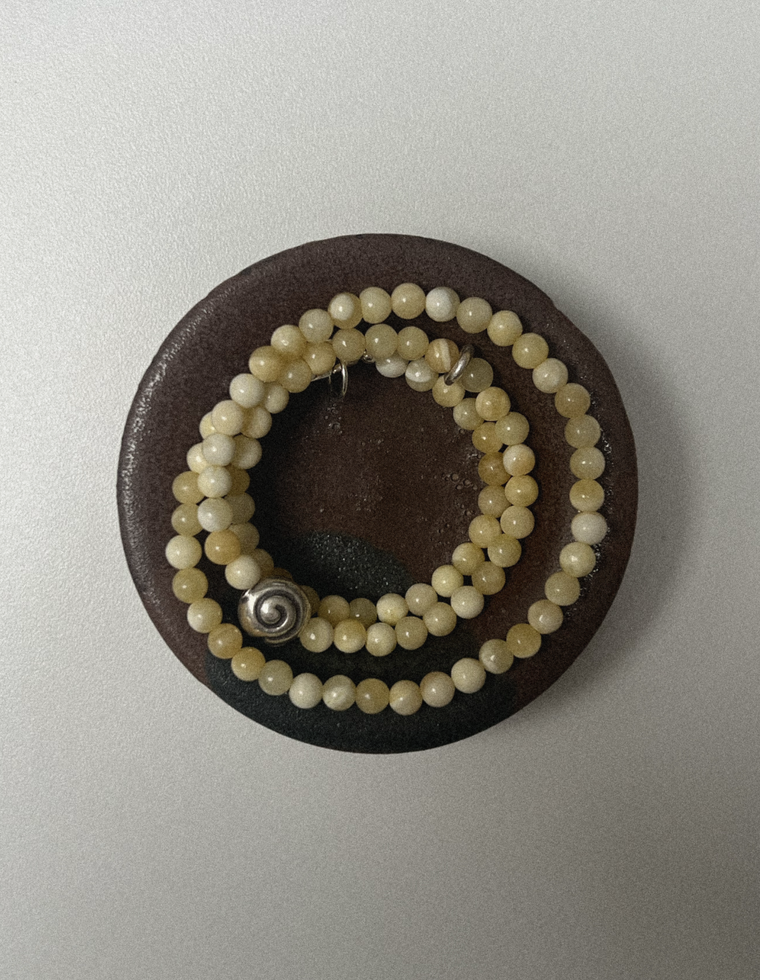 Voryn - Yellow Jade Spiral Necklace