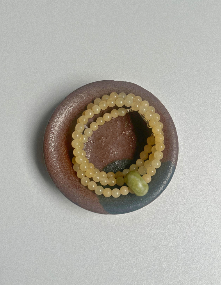Idle Hands 30 - Yellow Jade Movement Necklace