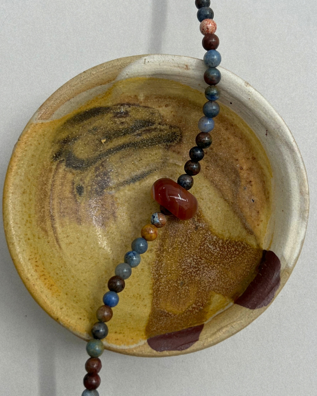 Celadon 4: dumortierite and carnelian movement necklace, hand-strung by Palm of Feronia