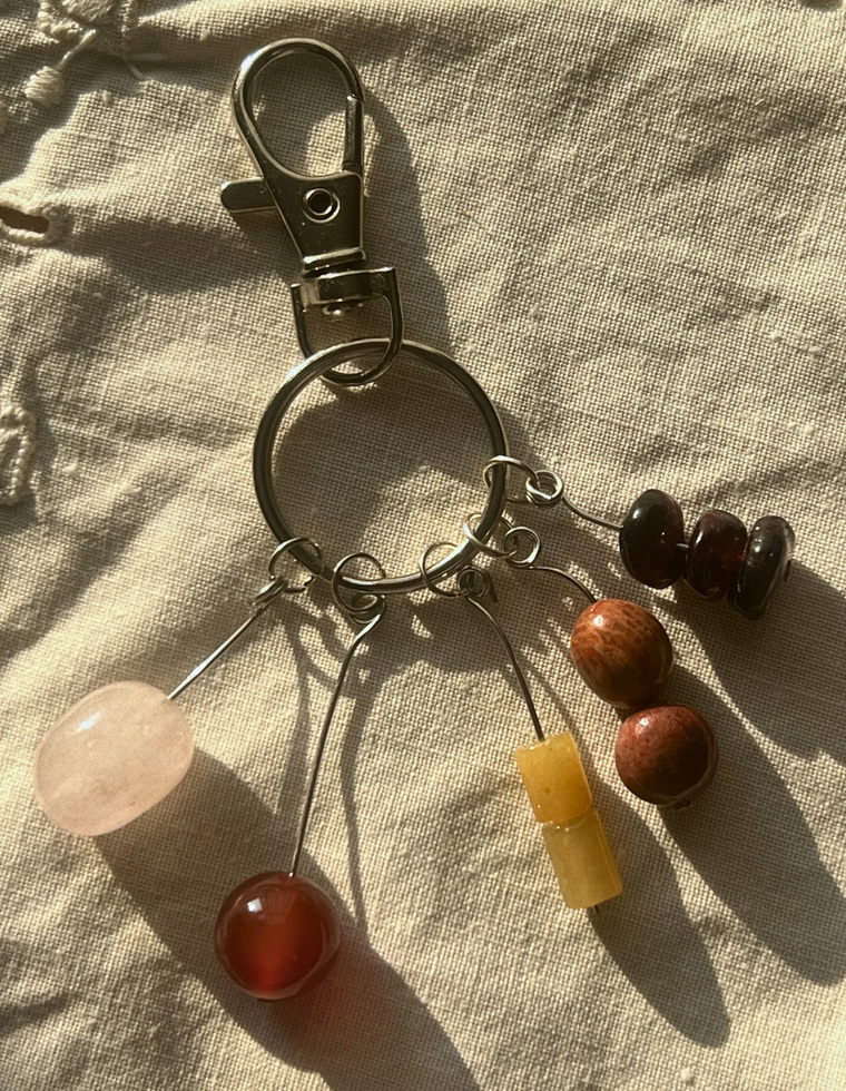 Orbit Charm – Garnet & Fossilised Coral